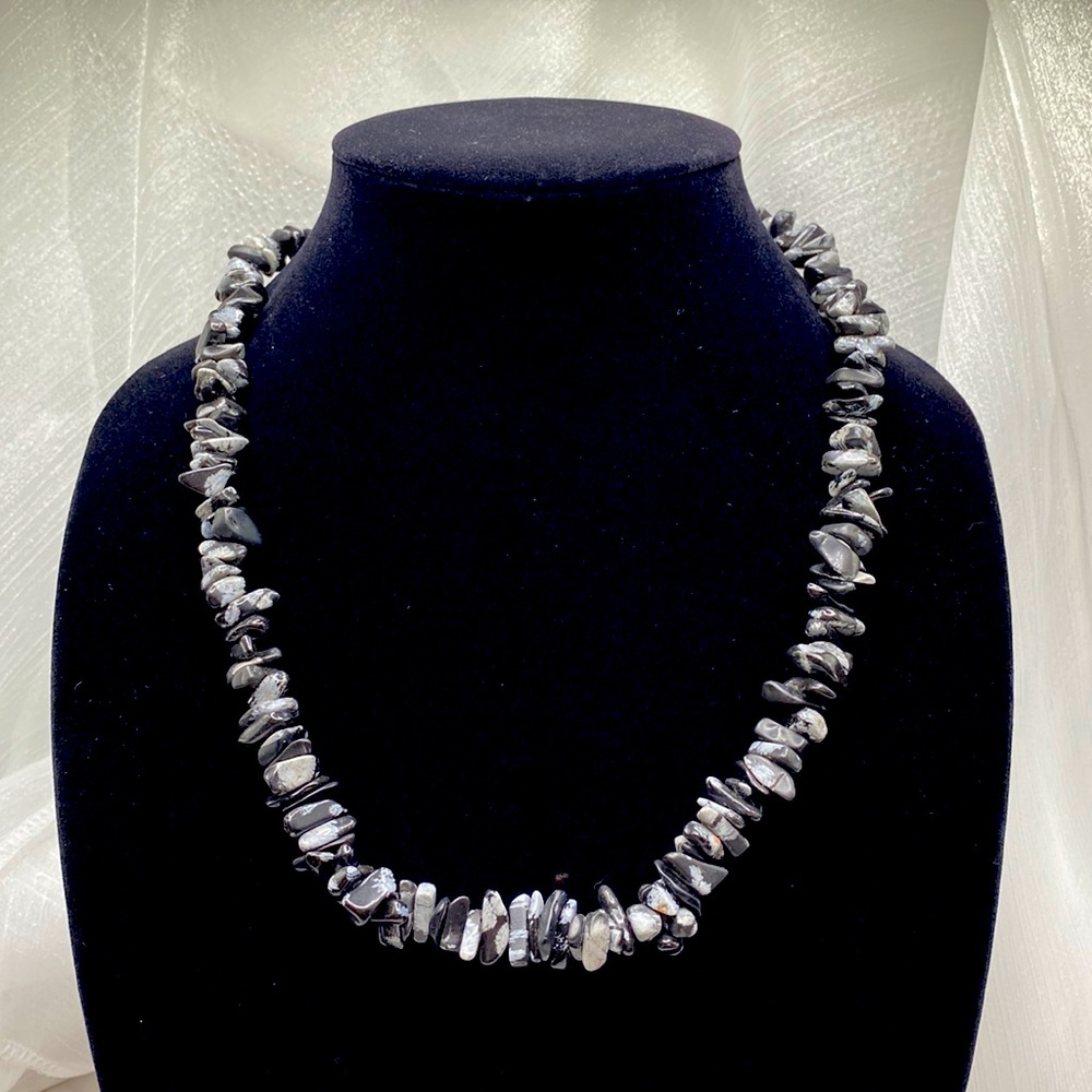 Gray and black gemstone chip necklace. This necklace is 36 in and eternity style